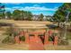 Brick seating area in a landscaped community at 2720 Stratford Hall Dr, Raleigh, NC 27614