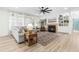 Bright living room boasts a fireplace, built-in shelves, and hardwood floors at 2720 Stratford Hall Dr, Raleigh, NC 27614