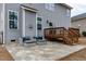 Relaxing stone patio and deck at 3048 Curling Creek Dr, Apex, NC 27502