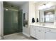 Bathroom features a walk-in shower and double vanity at 3142 Armeria Dr, Apex, NC 27502