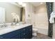 Bathroom with double vanity and bathtub at 3142 Armeria Dr, Apex, NC 27502