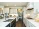Modern kitchen with stainless steel appliances and a large island at 3142 Armeria Dr, Apex, NC 27502