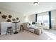 Spacious loft with comfortable seating and large windows at 3142 Armeria Dr, Apex, NC 27502