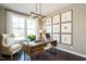 Bright home office features built-in shelving and natural light at 3142 Armeria Dr, Apex, NC 27502