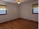 Vacant room features hardwood floors, neutral walls, and natural light at 405 N Ninth St, Mebane, NC 27302