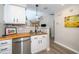 Kitchen with butcher block countertops and modern sink at 4118 Pin Oak Dr, Durham, NC 27707