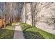 Landscaped side yard with concrete pathway at 4118 Pin Oak Dr, Durham, NC 27707