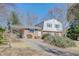 Brick home with a carport and a gently sloping driveway at 4121 Pin Oak Rd, Raleigh, NC 27604