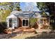 Brick house with attached sunroom and deck at 415 Englewood Ave, Durham, NC 27701