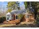 Brick house with sunroom and deck in backyard at 415 Englewood Ave, Durham, NC 27701