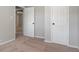 Cozy bedroom with neutral walls and carpet flooring at 423 Potter St, Durham, NC 27701