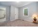 Bedroom with closet and neutral decor at 423 Potter St, Durham, NC 27701