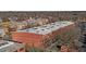 Aerial view showcasing the rear of a brick building and its urban environment at 500 N Duke St # 56-207, Durham, NC 27701