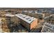 Aerial view of a brick building from a side angle, highlighting its design and urban location at 500 N Duke St # 56-207, Durham, NC 27701