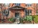 Brick building exterior with covered entryway and stairs at 500 N Duke St # 56-207, Durham, NC 27701