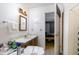 An en-suite bathroom, attached to the bedroom, that has a sink and tiled floor at 5141 Nc-39 N Hwy, Henderson, NC 27537