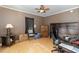Bedroom features a ceiling fan and wood-look flooring at 5141 Nc-39 N Hwy, Henderson, NC 27537