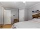 Bedroom includes a ceiling fan, wood-look flooring, and ample storage at 5141 Nc-39 N Hwy, Henderson, NC 27537