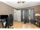 Bedroom features a ceiling fan and wood-look flooring at 5141 Nc-39 N Hwy, Henderson, NC 27537