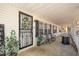 Inviting front porch decorated with plants and seating area, perfect for relaxing at 5141 Nc-39 N Hwy, Henderson, NC 27537