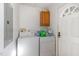 Laundry Room offers a washer and dryer with storage at 5141 Nc-39 N Hwy, Henderson, NC 27537
