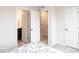 Bedroom featuring a doorway to an ensuite bathroom and a closet at 5238 Beardall St, Raleigh, NC 27616