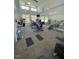 Bright community gym featuring exercise equipment and ceiling fans at 5238 Beardall St, Raleigh, NC 27616