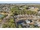 Aerial view of community, highlighting the neighborhood's landscape and amenities at 5809 Neuse Wood Dr, Raleigh, NC 27616