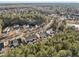 Aerial view of community, highlighting the neighborhood's landscape and amenities at 5809 Neuse Wood Dr, Raleigh, NC 27616