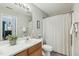 Bathroom with updated vanity and shower at 5809 Neuse Wood Dr, Raleigh, NC 27616