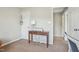 Small bedroom with desk and access to hallway at 5809 Neuse Wood Dr, Raleigh, NC 27616