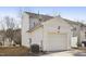 Attached single car garage with side yard at 5809 Neuse Wood Dr, Raleigh, NC 27616