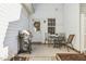 Small patio with table, chairs, and grill at 5809 Neuse Wood Dr, Raleigh, NC 27616