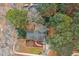 Aerial view showing the home's roof, backyard and street placement at 5920 Whittier Dr, Raleigh, NC 27609