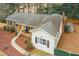 Aerial view of a home with a gray roof, well-maintained landscaping, and a shed in the backyard at 5920 Whittier Dr, Raleigh, NC 27609
