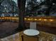 Inviting backyard deck area with decorative string lights on the fence at 5920 Whittier Dr, Raleigh, NC 27609