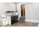 Laundry room featuring washer, dryer, shelving, sink, access to the main level, and vinyl flooring at 5920 Whittier Dr, Raleigh, NC 27609