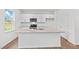 Kitchen island with granite countertop and stainless steel sink at 7611 Michelle Rd, Rocky Mount, NC 27803