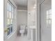 Simple bathroom with toilet, sink, and shower stall at 806 E Franklin St, Chapel Hill, NC 27514
