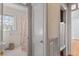 Bathroom with shower/tub combo and floral shower curtain at 806 E Franklin St, Chapel Hill, NC 27514