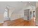 Bright bedroom with hardwood floors, built-in shelving and window seat at 806 E Franklin St, Chapel Hill, NC 27514