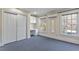 Spacious bedroom with double closet, desk area and window views at 806 E Franklin St, Chapel Hill, NC 27514