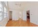 Hardwood floor bedroom with ensuite bath and walk-in closet at 806 E Franklin St, Chapel Hill, NC 27514