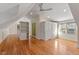Large bedroom with hardwood floors, built-in shelving and great natural light at 806 E Franklin St, Chapel Hill, NC 27514