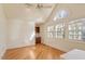 Spacious bedroom with hardwood floors and built-in desk at 806 E Franklin St, Chapel Hill, NC 27514
