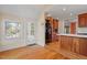 Breakfast room with hardwood floors and access to kitchen and backyard at 806 E Franklin St, Chapel Hill, NC 27514
