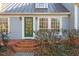 Welcoming front entrance with green door and brick steps at 806 E Franklin St, Chapel Hill, NC 27514