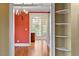 Bright hallway with built-in corner shelves and access to other rooms at 806 E Franklin St, Chapel Hill, NC 27514