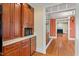 View of kitchen cabinets and access to dining room at 806 E Franklin St, Chapel Hill, NC 27514