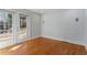 Bright office with hardwood floors and French doors leading to the backyard at 806 E Franklin St, Chapel Hill, NC 27514